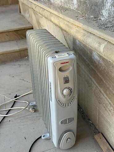 irşad electronics qaz sobalari: Nikai yağ radiatoru (elektrik qızdırıcısı) - Brend/model: Nikai, yağ — 1