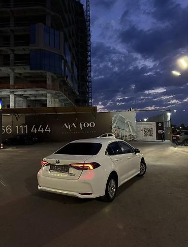 voxy noah: Toyota Corolla: 2021 г., 1.8 л, Вариатор, Гибрид, Седан — 6