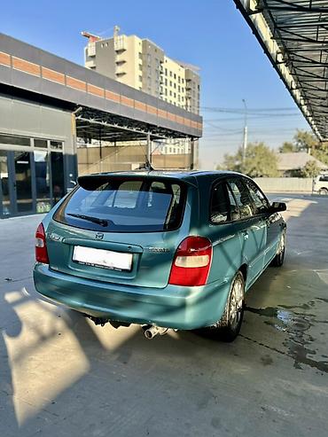 50 55: Mazda 323: 2001 г., 1.6 л, Автомат, Бензин, Хэтчбэк — 4
