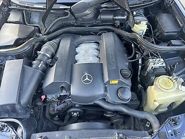 Mercedes-Benz: Mercedes-Benz E-Class: 2.4 l | 1998 il Sedan — 12