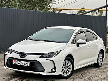 Toyota Corolla: 2021 г., 1.8 л, Автомат, Гибрид, Седан
