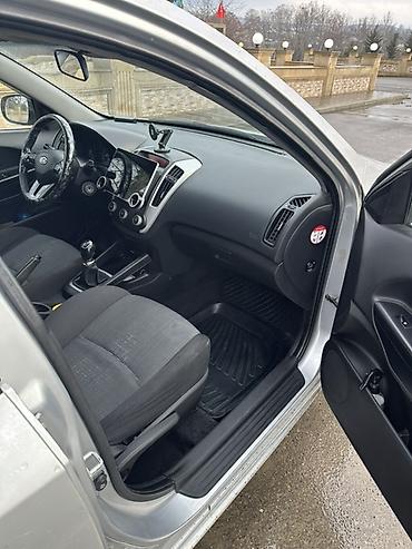 Kia: Kia Ceed: 1.6 l | 2009 il Universal — 12