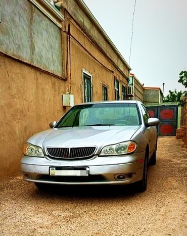 Polo köynəklər: Nissan Maxima: 0.3 l | 2004 il Sedan