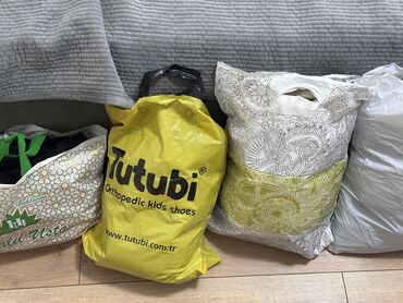 curaprox бишкек: 4 пакета с одеждой