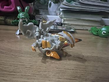 Ёлочные игрушки и шары: Набор фигурок Bakugan с картой-активацией. Состав и особенности: - 2 — 4