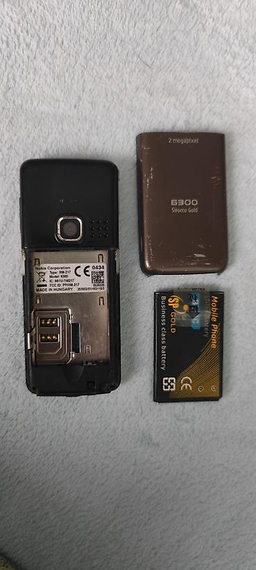 nokia 302: Nokia < 2 GB Memory Capacity, rəng - Qızılı, Düyməli — 2