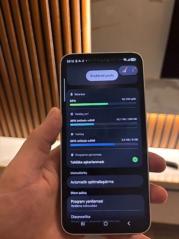 Мобильные телефоны и аксессуары: Samsung Galaxy S23 FE, 256 ГБ, цвет - Белый, Face ID — 1