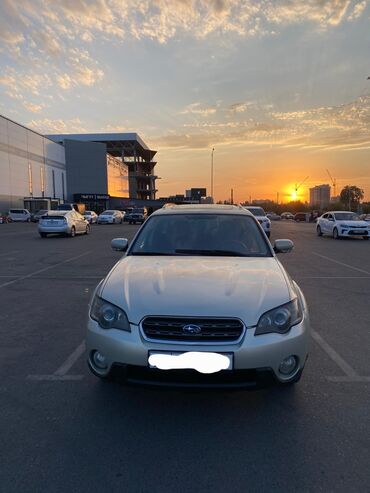 фара субару аутбек: Универсал Subaru Outback серебристого цвета, оснащенный багажником на
