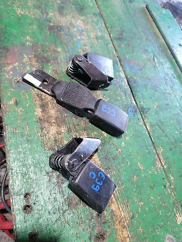 brodic za prihranu ribe: BMW E39 – zakacka pojasa - Originalni graničnici vrata za BMW E39 — 1