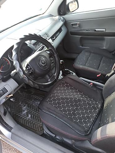 discovery 3: Mazda Demio: 2003 г., 1.4 л, Механика, Бензин, Хэтчбэк — 8