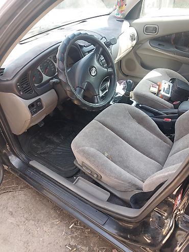 Унаа сатуу: Nissan Almera: 2001 г., 2.2 л, Кол менен иштөөчү, Дизель, Хетчбек — 6