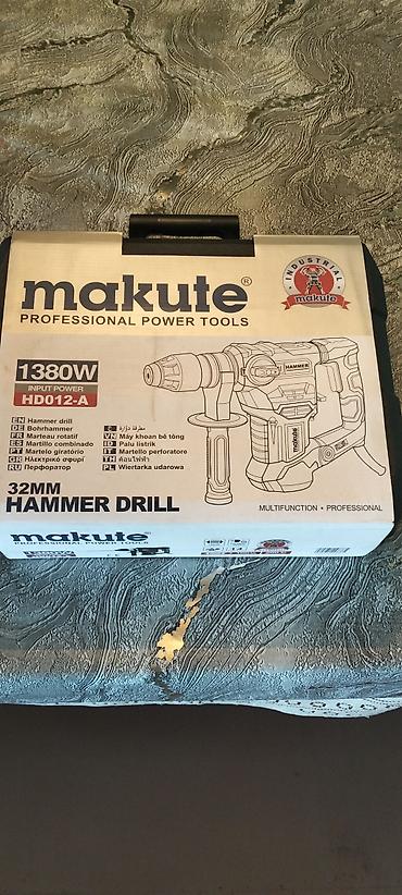peraparatır: Makute HD012-A 32 mm perforator/udarli drel - Güc: 1380 W (Input — 1