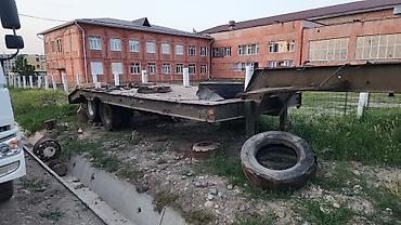 прицеп для квадроцикла: Низкорамный полуприцеп-площадка для тяжелой техники. - Конструкция — 2