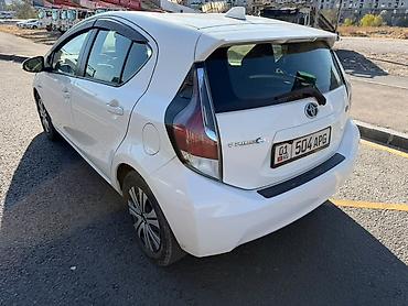 tayota vindom: Toyota Prius C: 2016 г., Автомат, Гибрид, Хэтчбэк — 4