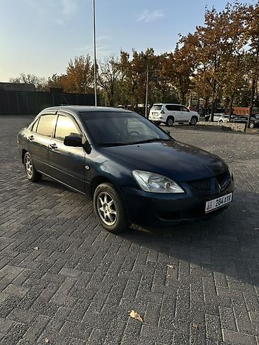 не спеша: Mitsubishi Lancer: 2004 г., 2 л, Автомат, Бензин, Седан — 3