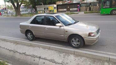алфард авто: Mazda 323: 1992 г., 1.6 л, Автомат, Бензин, Седан