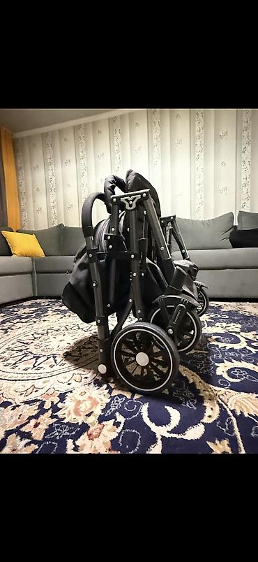 Коляски: Коляска (черная), складная Особенности: - Легкая алюминиевая рама — 9