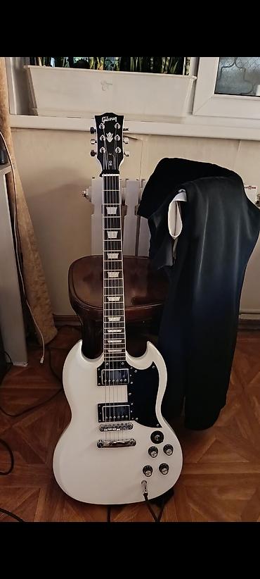 Гитары: Электрогитара gibson sg в белом цвете.Гитара полностью отстроенна — 2