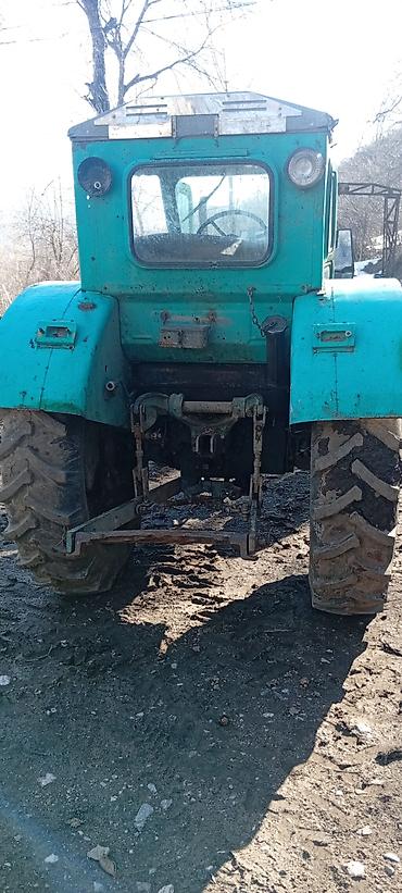 Другие тракторы: Трактор колесный, класс тяги 1,4–2,0 (визуально из серии советских — 4