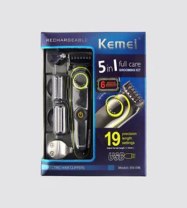 Бытовая техника: №: 12914 Məhsulun adı: Saç kəsimi üçün cihaz Kemei KM-696, qara — 1