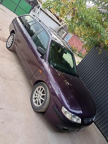 Mazda: Mazda 323: 2000 г., Универсал — 1
