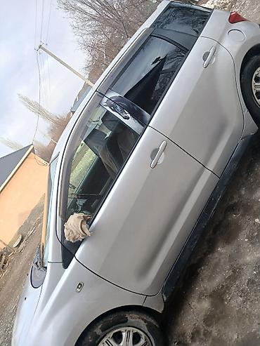 Другие автомобили: Компактный городской хэтчбек/минивэн с киргизскими номерами (KG, серия — 4