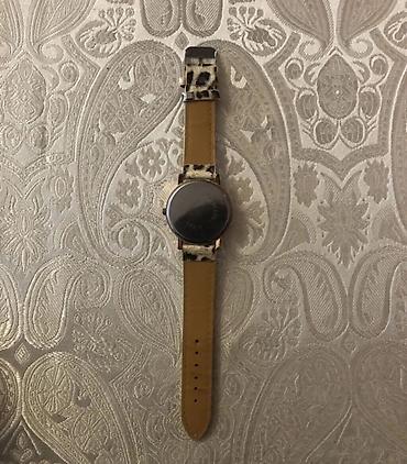 Digər: Qadın qol saatı - Korpus: qızılı tonlu dairəvi korpus, kənarı daş — 2