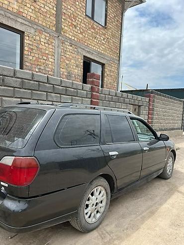 p11: Nissan Primera: 2001 г., 2 л, Автомат, Бензин, Универсал — 5