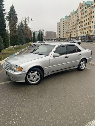 yangin sonduren masin sekilleri: Mercedes-Benz 200: 2 l | 1995 il Sedan