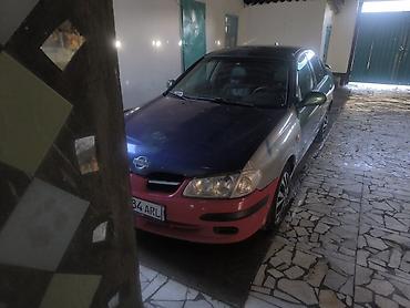 sl 55: Nissan Almera: 2000 г., Механика, Седан — 9