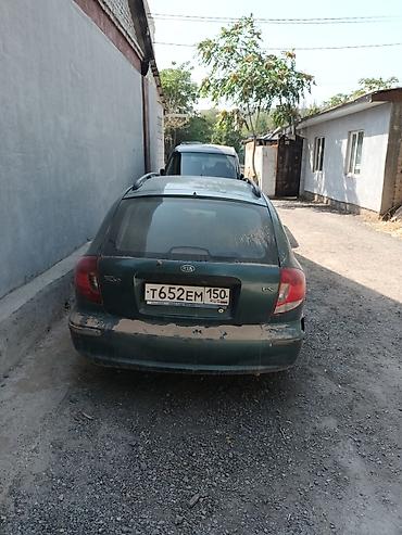 жд тупик: Kia Rio универсал (поколение начала 2000‑х), зеленый металлик машину — 4