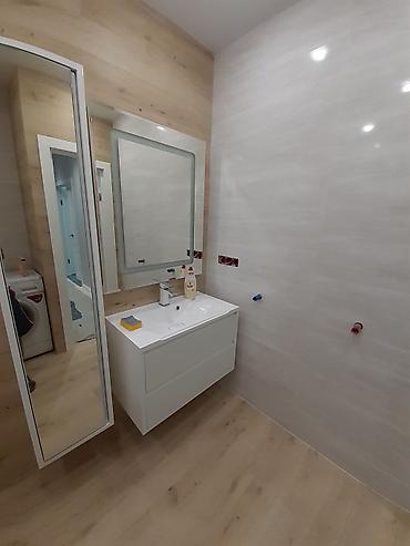 Ремонт под ключ: Ванная комната под ключ — современный интерьер в светлых тонах дерева — 1