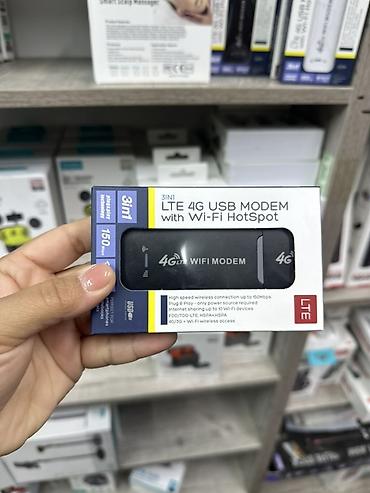 Модемы и сетевое оборудование: LTE 4G USB модем с Wi‑Fi Hotspot (3‑в‑1) Описание: - Компактный 4G — 2