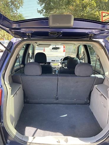wuling mini ev: Mazda Demio: 2003 г., 1.3 л, Автомат, Бензин, Хэтчбэк — 7