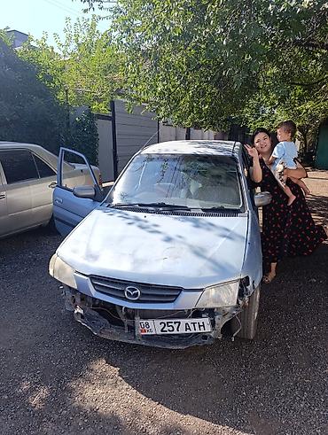 chek it: Mazda Demio: 2001 г., Автомат, Бензин, Хэтчбэк — 3