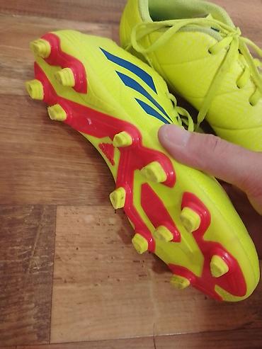 Kopačke: Fudbalske kopačke Adidas (model linije Nemeziz) za prirodnu travu - — 10