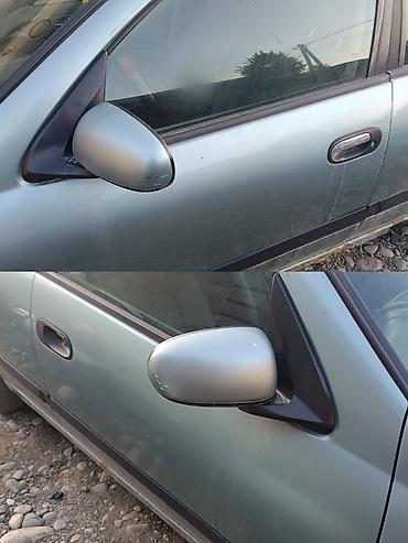 neta ls: Nissan Almera N16 
Ниссан Альмера н16 2001
зеркала заднего вида — 1