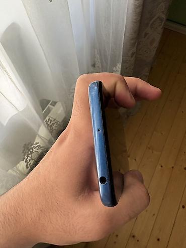 Digər mobil telefonlar: TCL 20E smartfon - Ekran: 6.52" HD+ (720×1600), damla-notch ön kamera — 6
