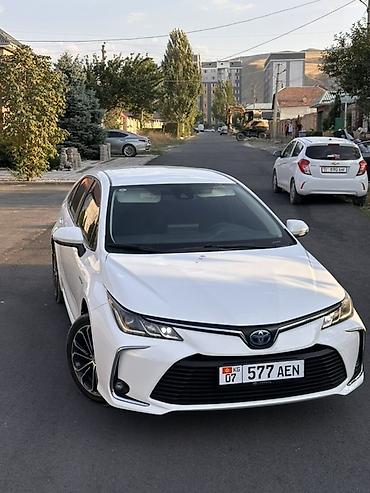 Toyota Corolla: 2022 г., 1.8 л, Автомат, Гибрид, Седан at lalafo.kg Toyota Corolla: 2022 г., 1.8 л, Автомат, Гибрид, Седан