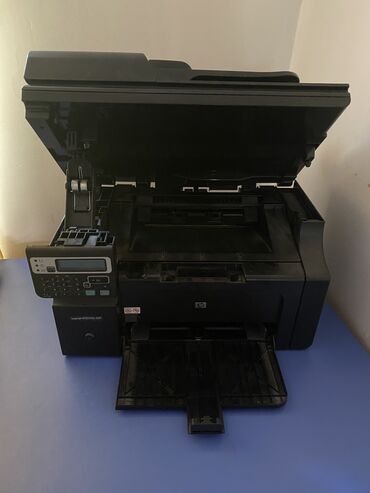 принтер: Ideal veziyyetde aq qara printerdir. Tep tezedir. Modeli hp laserjet