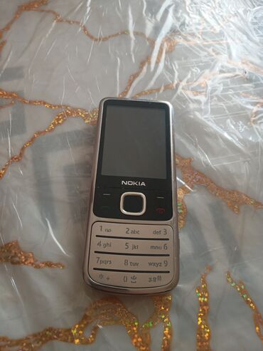 nokia qiymeti: Nokia 6700 Slide, Zəmanət, Düyməli