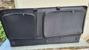 Futlyarlar, çexollar: Korg klaviatura daşımaq üçün nəzərdə tutulmuş bu qara rəngli çanta — 17