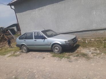 малолитражка авто: Автомобиль Toyota Corolla, представленный в кузове хэтчбек с пятью