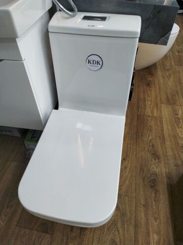 купить унитаз с бачком недорого: Ağ rəngli, müasir dizaynlı unitaz. Hamam və ya tualet otağı üçün rahat