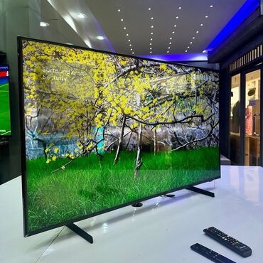 мониторы quantum dot: Телевизор Samsung с плоским экраном и узкими рамками обеспечивает