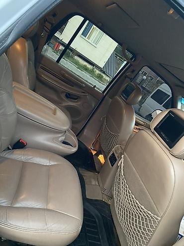 кожаный чехол: Lincoln Navigator: 1998 г., 5.4 л, Автомат, Газ, Внедорожник — 5
