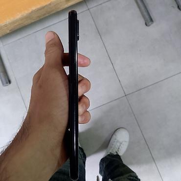 xiomi 14 qiymeti: Xiaomi 128 GB, rəng - Qara, 
 Barmaq izi — 5