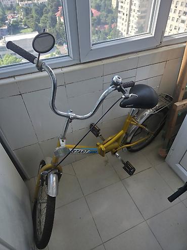 4 teker velosiped: Rusiya istehsalı START 400 velosipedi. 20-lik ölçüdədir. Əl tormozu — 2
