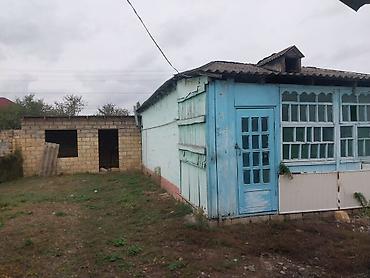 bakixanovda torpaq satisi: Satılır: həyət evi .yolun yaninda suyu qazi iwigi herweyi var 18 sotun — 2