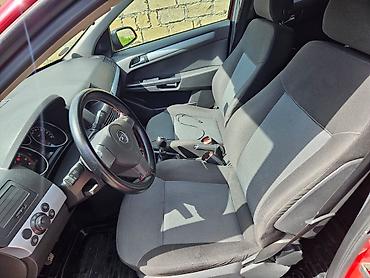 Opel: Opel Astra H hatchback – parlaq qırmızı rəngdə, 5 qapı. Texniki — 7